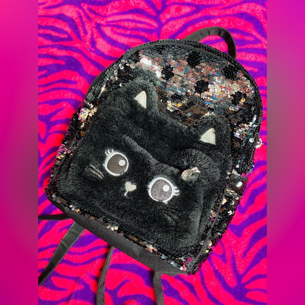 Justice flip sequin black and silver cat backpack
